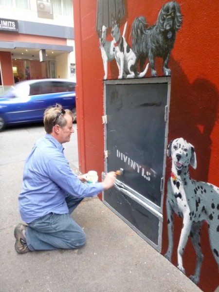 Peter Gouldthorpe painting Chrissy's Divinyls amplifier and her dogs (Image: Peter Gouldthorpe)