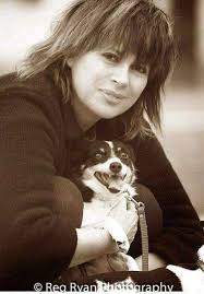 Photograph of Chrissy Amphlett and her dogs by Reg Ryan.